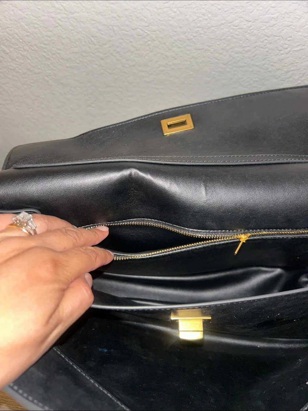 Black Leather Top-Handle Bag with Gold Hardware, keychain and lucky charm